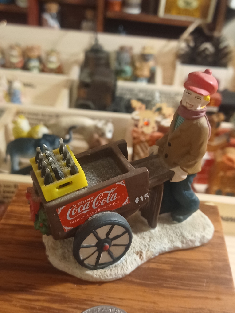 Coca Cola Brown Cart Figurine with Red Hat and Yellow Crate